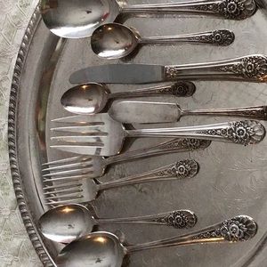 12 place setting of antique silver flatware